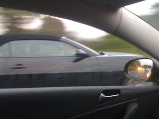 Illustration for article titled Camaro Convertible Snapped Still Sneaking Around Australia